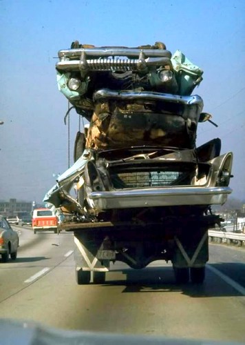 Vintage 50s cars being trucked