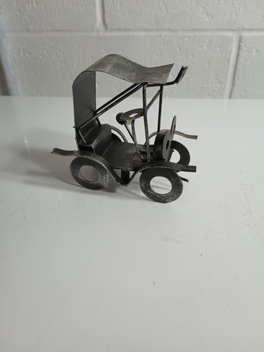 Scrap metal art antique car - antique,